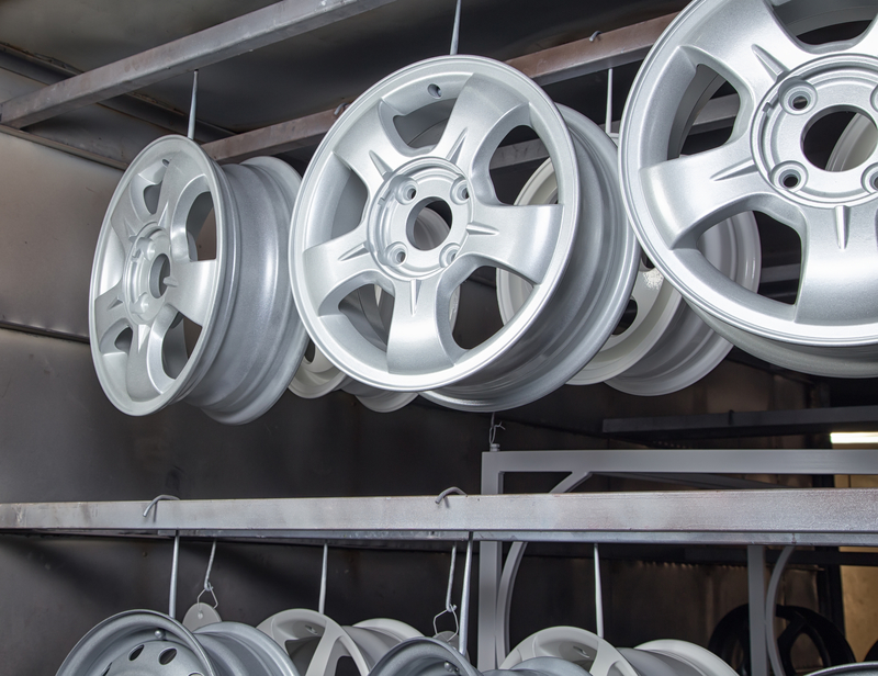 Drying of metal new auto wheels in workshop