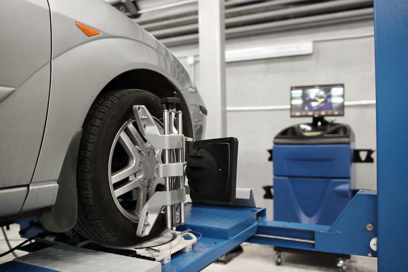 Car on a ramp for wheel maintenance