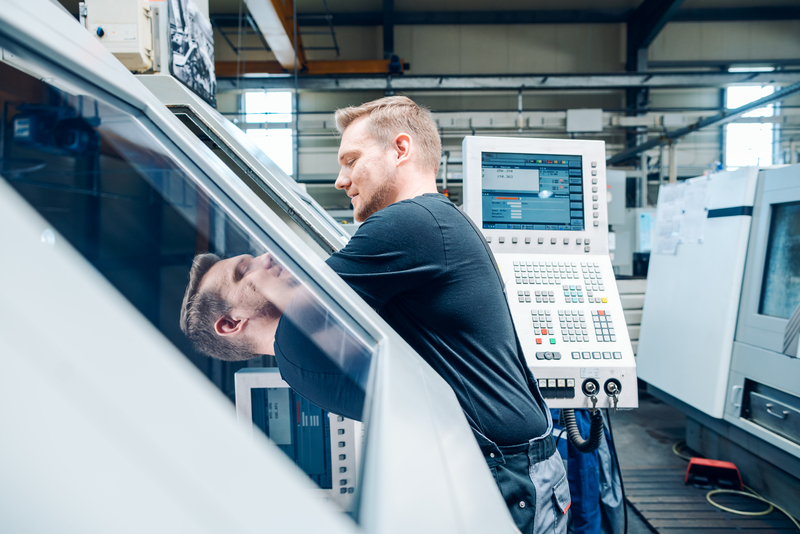 CNC lathe worker